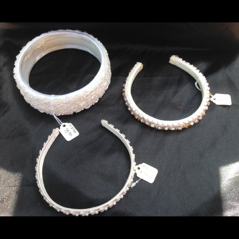 Three wedding hair accessories.